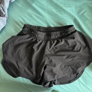 Black all in motion flutter shorts size youth Large